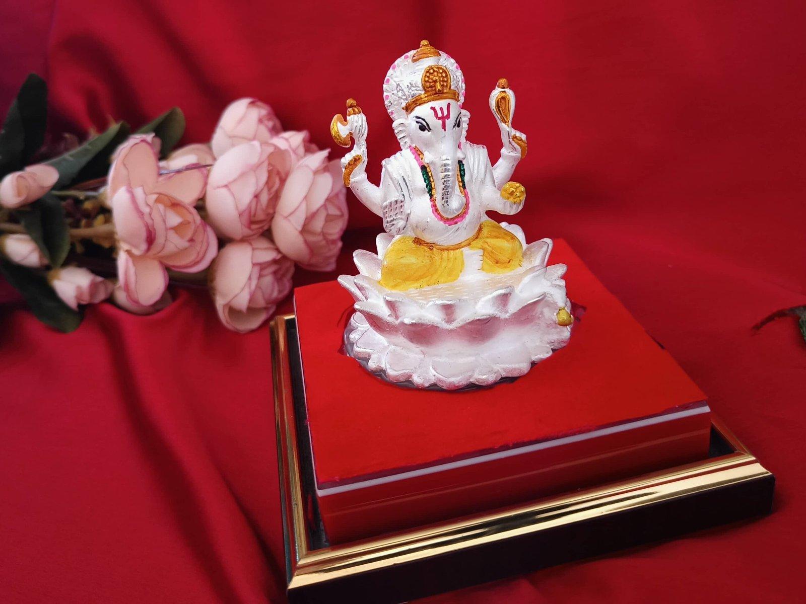 Meena Ganesh / Ganapati / Siddhivinayak sitting on a lotus