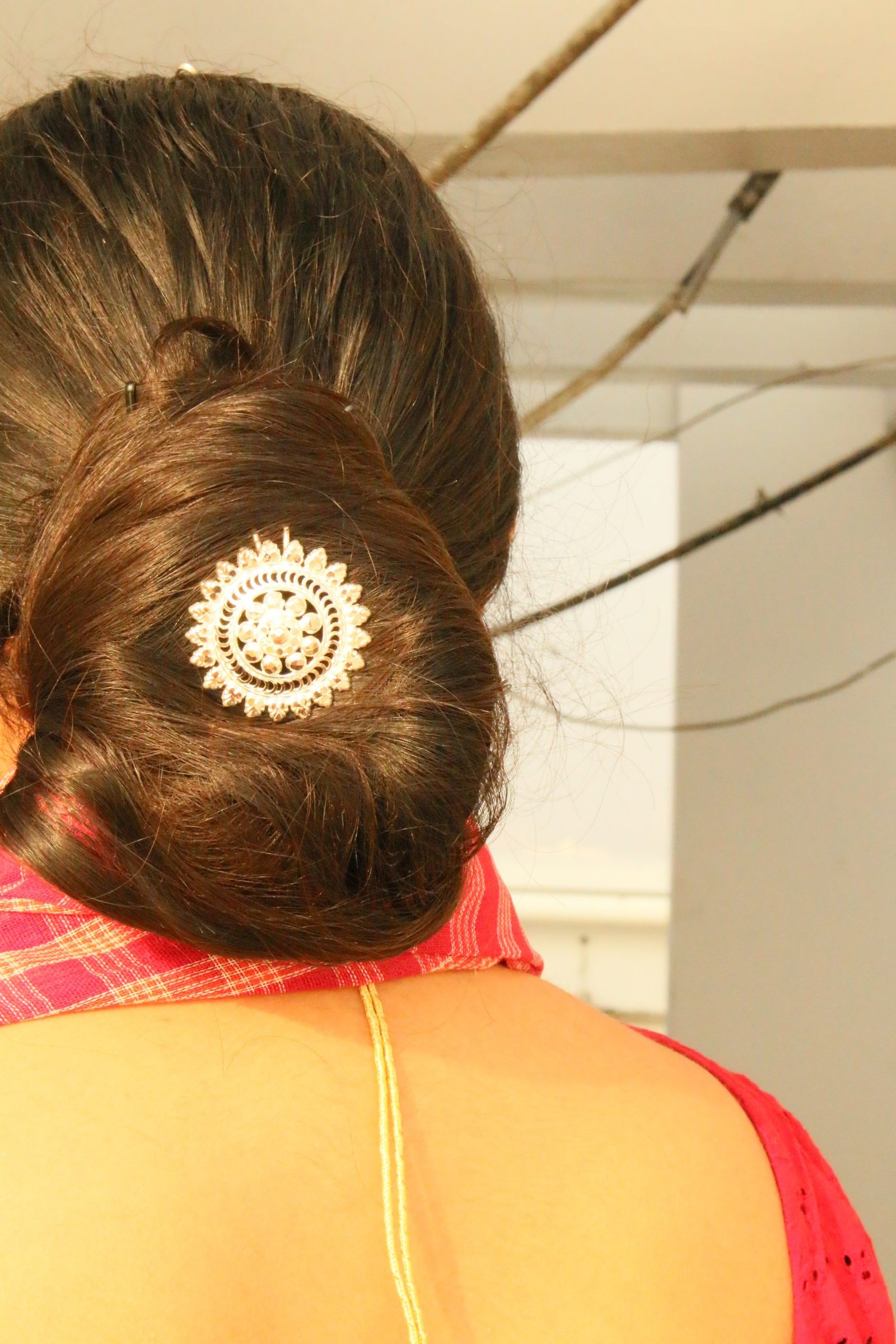 Elegant Low Bun Hairstyle with Gajra & Juda Pin