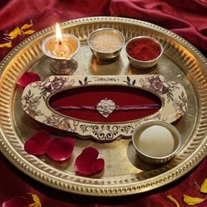 Rakhi Raksha 9 Ganesh leaf Rakhi Package